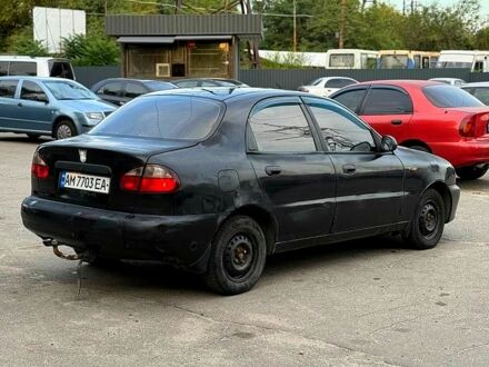 Чорний Деу Ланос, об'ємом двигуна 1.5 л та пробігом 200 тис. км за 850 $, фото 1 на Automoto.ua