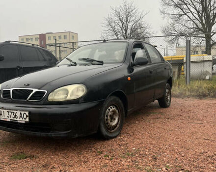 Черный Дэу Ланос, объемом двигателя 1.5 л и пробегом 298 тыс. км за 1000 $, фото 1 на Automoto.ua