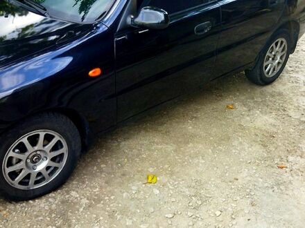 Черный Дэу Ланос, объемом двигателя 1.5 л и пробегом 187 тыс. км за 2600 $, фото 1 на Automoto.ua