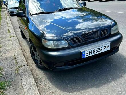 Черный Дэу Ланос, объемом двигателя 1.5 л и пробегом 123 тыс. км за 2200 $, фото 1 на Automoto.ua