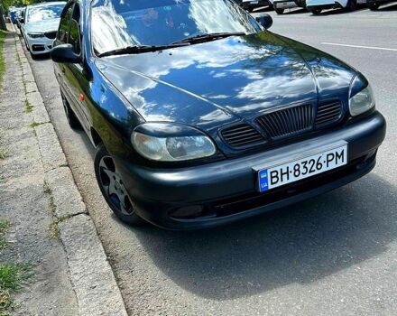 Черный Дэу Ланос, объемом двигателя 1.5 л и пробегом 123 тыс. км за 2200 $, фото 1 на Automoto.ua