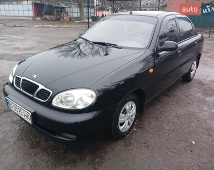 Черный Дэу Ланос, объемом двигателя 1.35 л и пробегом 122 тыс. км за 1699 $, фото 1 на Automoto.ua