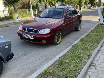 Чорний Деу Ланос, об'ємом двигуна 1.5 л та пробігом 240 тис. км за 1350 $, фото 1 на Automoto.ua