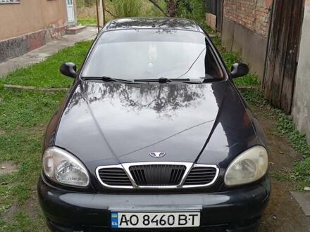 Черный Дэу Ланос, объемом двигателя 1.5 л и пробегом 272 тыс. км за 2000 $, фото 1 на Automoto.ua