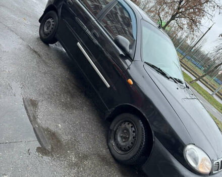 Черный Дэу Ланос, объемом двигателя 1.5 л и пробегом 350 тыс. км за 2450 $, фото 1 на Automoto.ua