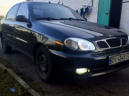 Черный Дэу Ланос, объемом двигателя 1.5 л и пробегом 162 тыс. км за 2000 $, фото 1 на Automoto.ua