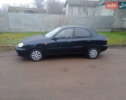 Черный Дэу Ланос, объемом двигателя 1.5 л и пробегом 230 тыс. км за 2350 $, фото 1 на Automoto.ua