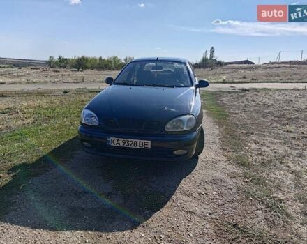 Черный Дэу Ланос, объемом двигателя 1.6 л и пробегом 271 тыс. км за 2000 $, фото 1 на Automoto.ua