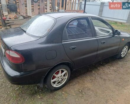 Черный Дэу Ланос, объемом двигателя 1.5 л и пробегом 158 тыс. км за 1250 $, фото 1 на Automoto.ua