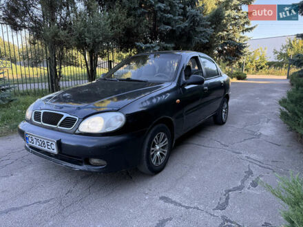 Деу Ланос 2007 у Нежине на Automoto.ua Чорний Деу Ланос, об'ємом двигуна 1.5 л та пробігом 200 тис. км за 1450 $, фото 1 на Automoto.ua