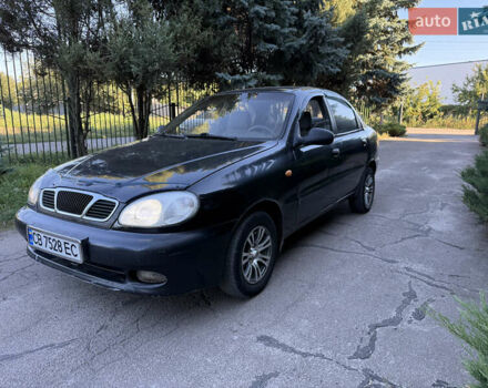 Чорний Деу Ланос, об'ємом двигуна 1.5 л та пробігом 200 тис. км за 1450 $, фото 1 на Automoto.ua