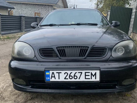 Черный Дэу Ланос, объемом двигателя 1.5 л и пробегом 270 тыс. км за 2400 $, фото 1 на Automoto.ua