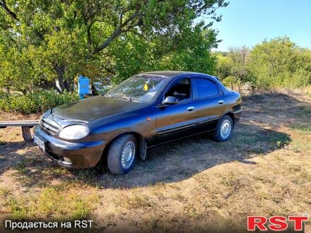 Черный Дэу Ланос, объемом двигателя 1.5 л и пробегом 253 тыс. км за 2300 $, фото 1 на Automoto.ua