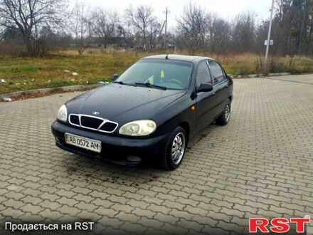 Черный Дэу Ланос, объемом двигателя 1.6 л и пробегом 200 тыс. км за 1600 $, фото 1 на Automoto.ua