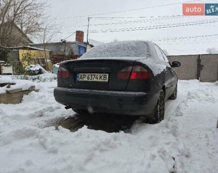 Черный Дэу Ланос, объемом двигателя 1.5 л и пробегом 241 тыс. км за 2400 $, фото 1 на Automoto.ua