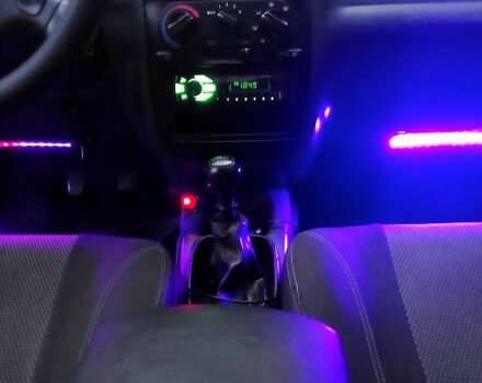 Черный Дэу Ланос, объемом двигателя 1.6 л и пробегом 200 тыс. км за 1850 $, фото 1 на Automoto.ua