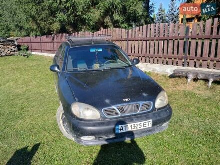 Черный Дэу Ланос, объемом двигателя 1.5 л и пробегом 200 тыс. км за 1018 $, фото 1 на Automoto.ua