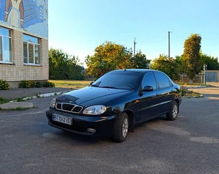 Черный Дэу Ланос, объемом двигателя 1.5 л и пробегом 155 тыс. км за 2600 $, фото 1 на Automoto.ua
