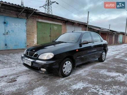 Чорний Деу Ланос, об'ємом двигуна 1.5 л та пробігом 151 тис. км за 2499 $, фото 1 на Automoto.ua