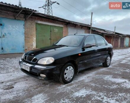 Черный Дэу Ланос, объемом двигателя 1.5 л и пробегом 151 тыс. км за 2499 $, фото 1 на Automoto.ua