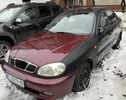 Черный Дэу Ланос, объемом двигателя 1.6 л и пробегом 267 тыс. км за 1050 $, фото 1 на Automoto.ua