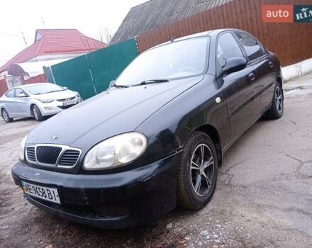 Черный Дэу Ланос, объемом двигателя 1.5 л и пробегом 141 тыс. км за 1700 $, фото 1 на Automoto.ua