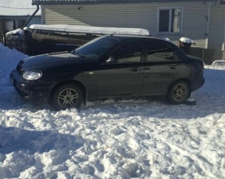 Черный Дэу Ланос, объемом двигателя 1.5 л и пробегом 300 тыс. км за 2000 $, фото 1 на Automoto.ua