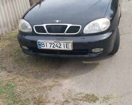 Чорний Деу Ланос, об'ємом двигуна 1.5 л та пробігом 165 тис. км за 2600 $, фото 1 на Automoto.ua