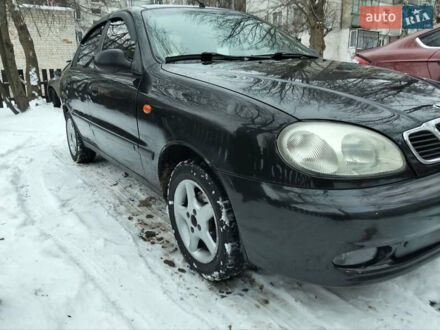 Чорний Деу Ланос, об'ємом двигуна 1.5 л та пробігом 200 тис. км за 2250 $, фото 1 на Automoto.ua