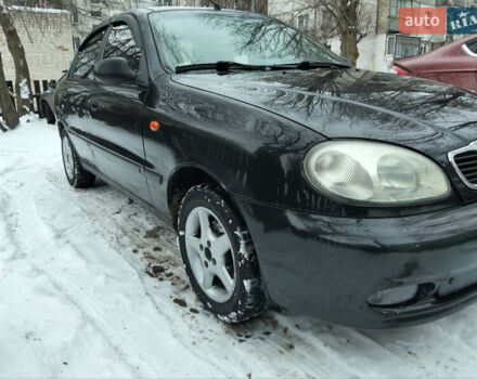 Черный Дэу Ланос, объемом двигателя 1.5 л и пробегом 200 тыс. км за 2250 $, фото 1 на Automoto.ua