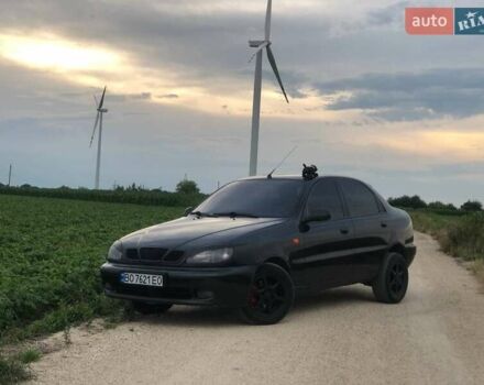Чорний Деу Ланос, об'ємом двигуна 1.6 л та пробігом 273 тис. км за 2800 $, фото 1 на Automoto.ua