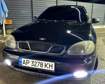 Черный Дэу Ланос, объемом двигателя 1.5 л и пробегом 250 тыс. км за 2800 $, фото 1 на Automoto.ua