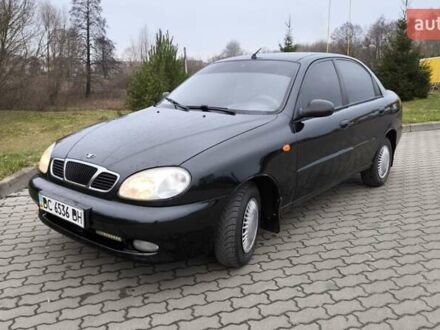 Чорний Деу Ланос, об'ємом двигуна 1.39 л та пробігом 213 тис. км за 2300 $, фото 1 на Automoto.ua