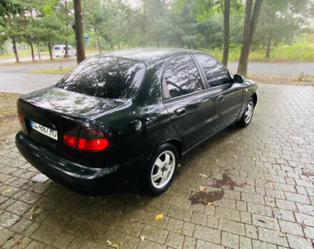 Чорний Деу Ланос, об'ємом двигуна 0 л та пробігом 250 тис. км за 1450 $, фото 1 на Automoto.ua