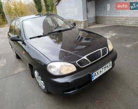 Черный Дэу Ланос, объемом двигателя 1.5 л и пробегом 351 тыс. км за 2000 $, фото 1 на Automoto.ua