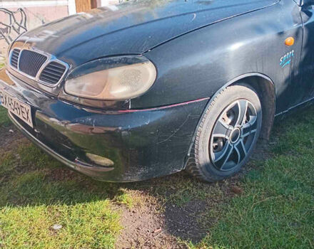 Черный Дэу Ланос, объемом двигателя 1.5 л и пробегом 136 тыс. км за 2250 $, фото 1 на Automoto.ua