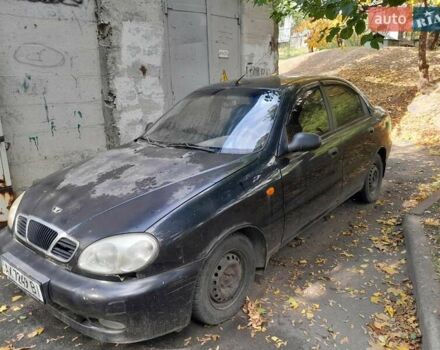Черный Дэу Ланос, объемом двигателя 1.5 л и пробегом 170 тыс. км за 2000 $, фото 1 на Automoto.ua