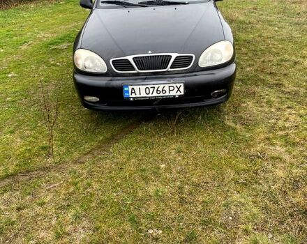 Черный Дэу Ланос, объемом двигателя 1.5 л и пробегом 256 тыс. км за 1100 $, фото 1 на Automoto.ua