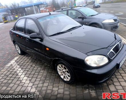 Черный Дэу Ланос, объемом двигателя 1.5 л и пробегом 220 тыс. км за 1000 $, фото 1 на Automoto.ua