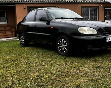 Чорний Деу Ланос, об'ємом двигуна 1.5 л та пробігом 200 тис. км за 2000 $, фото 1 на Automoto.ua