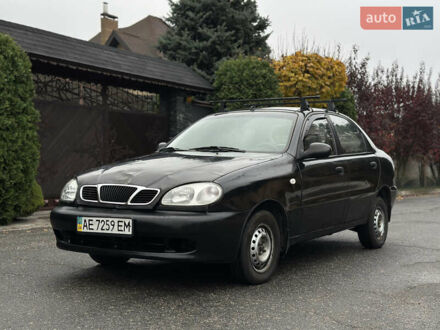 Чорний Деу Ланос, об'ємом двигуна 1.5 л та пробігом 267 тис. км за 1499 $, фото 1 на Automoto.ua