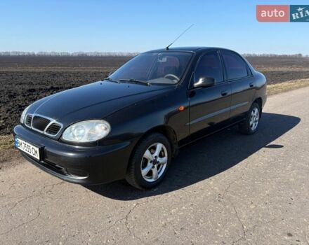 Черный Дэу Ланос, объемом двигателя 1.5 л и пробегом 205 тыс. км за 2100 $, фото 1 на Automoto.ua