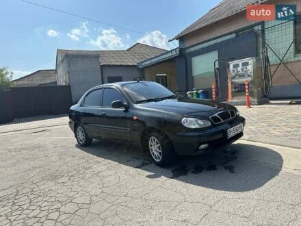 Черный Дэу Ланос, объемом двигателя 1.5 л и пробегом 130 тыс. км за 2700 $, фото 1 на Automoto.ua