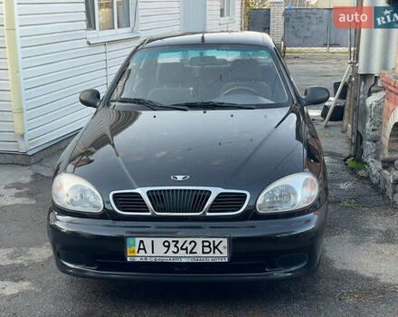 Черный Дэу Ланос, объемом двигателя 1.5 л и пробегом 100 тыс. км за 3000 $, фото 1 на Automoto.ua