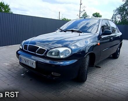 Черный Дэу Ланос, объемом двигателя 1.6 л и пробегом 300 тыс. км за 2800 $, фото 1 на Automoto.ua
