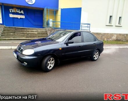 Черный Дэу Ланос, объемом двигателя 1.6 л и пробегом 200 тыс. км за 2100 $, фото 1 на Automoto.ua