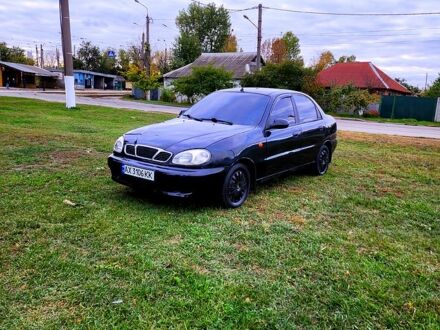 Черный Дэу Ланос, объемом двигателя 1.4 л и пробегом 199 тыс. км за 1700 $, фото 1 на Automoto.ua