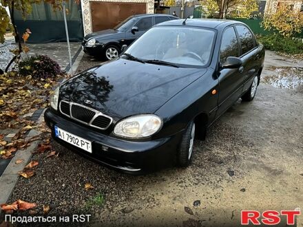 Черный Дэу Ланос, объемом двигателя 1.4 л и пробегом 220 тыс. км за 1800 $, фото 1 на Automoto.ua