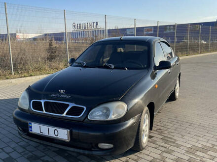 Черный Дэу Ланос, объемом двигателя 1.4 л и пробегом 177 тыс. км за 1750 $, фото 1 на Automoto.ua