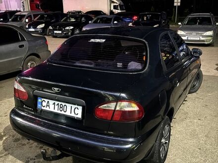 Черный Дэу Ланос, объемом двигателя 1.5 л и пробегом 292 тыс. км за 2300 $, фото 1 на Automoto.ua